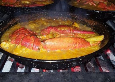 scampi cotti su brace ne forno a carbone